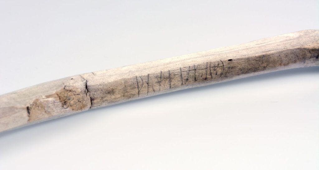 A walking stick with a runic inscription