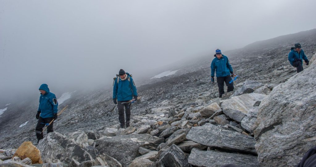 Archaeologists are surveying the scree at Lendbreen after the ice melted away. 