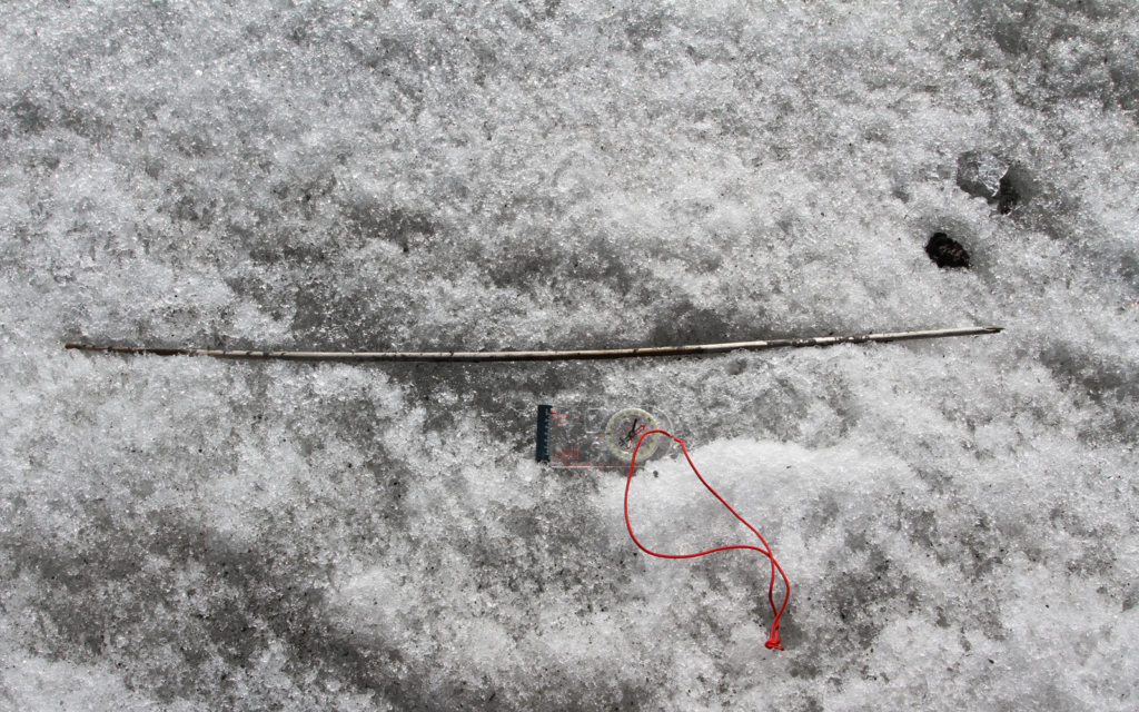 A four thousand years old wooden arrowshaft, found on the ice surface in Jotunheimen in 2014, when melting reached old ice. 