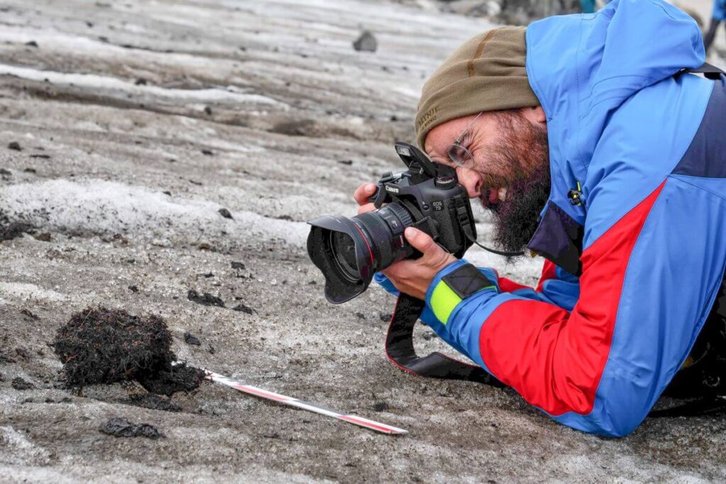 Taking photos on a glacial archaeological site
