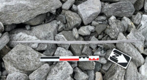 A scaring stick lying on the ground